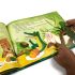 El viaje de Ilombe abierto durante la lectura, con ilustración a página completa
